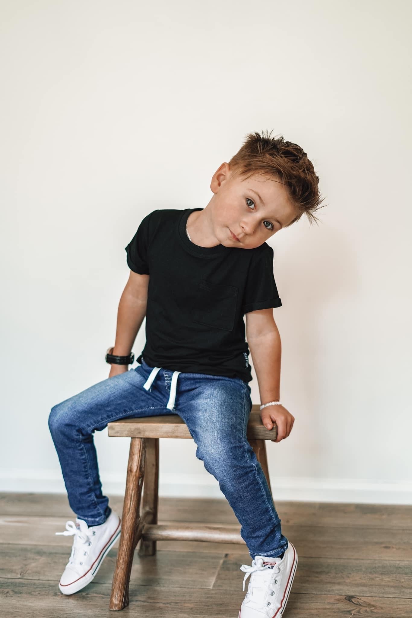 Boy in kids trendy outfit with kids denim