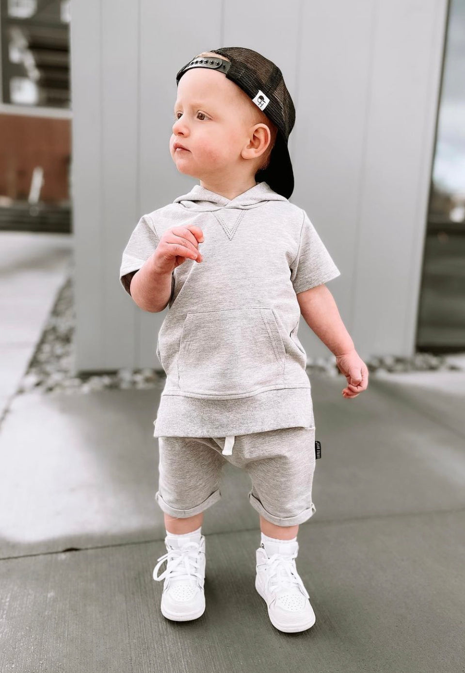 toddler in toddler trendy outfit with toddler grey sweat shorts