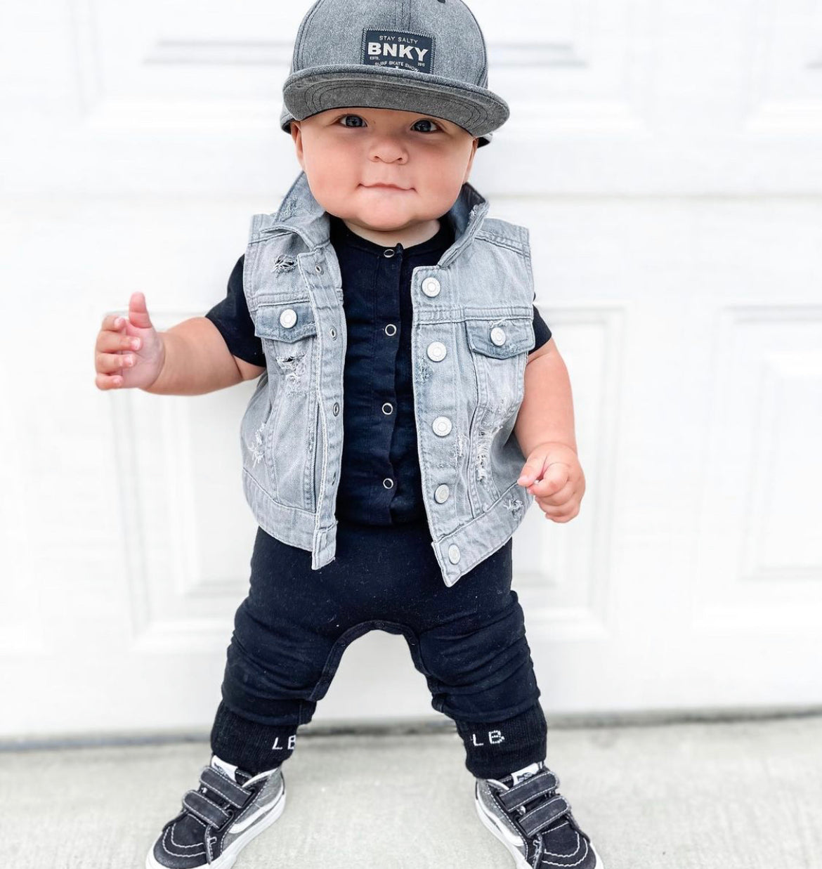 baby trendy outfit with black romper