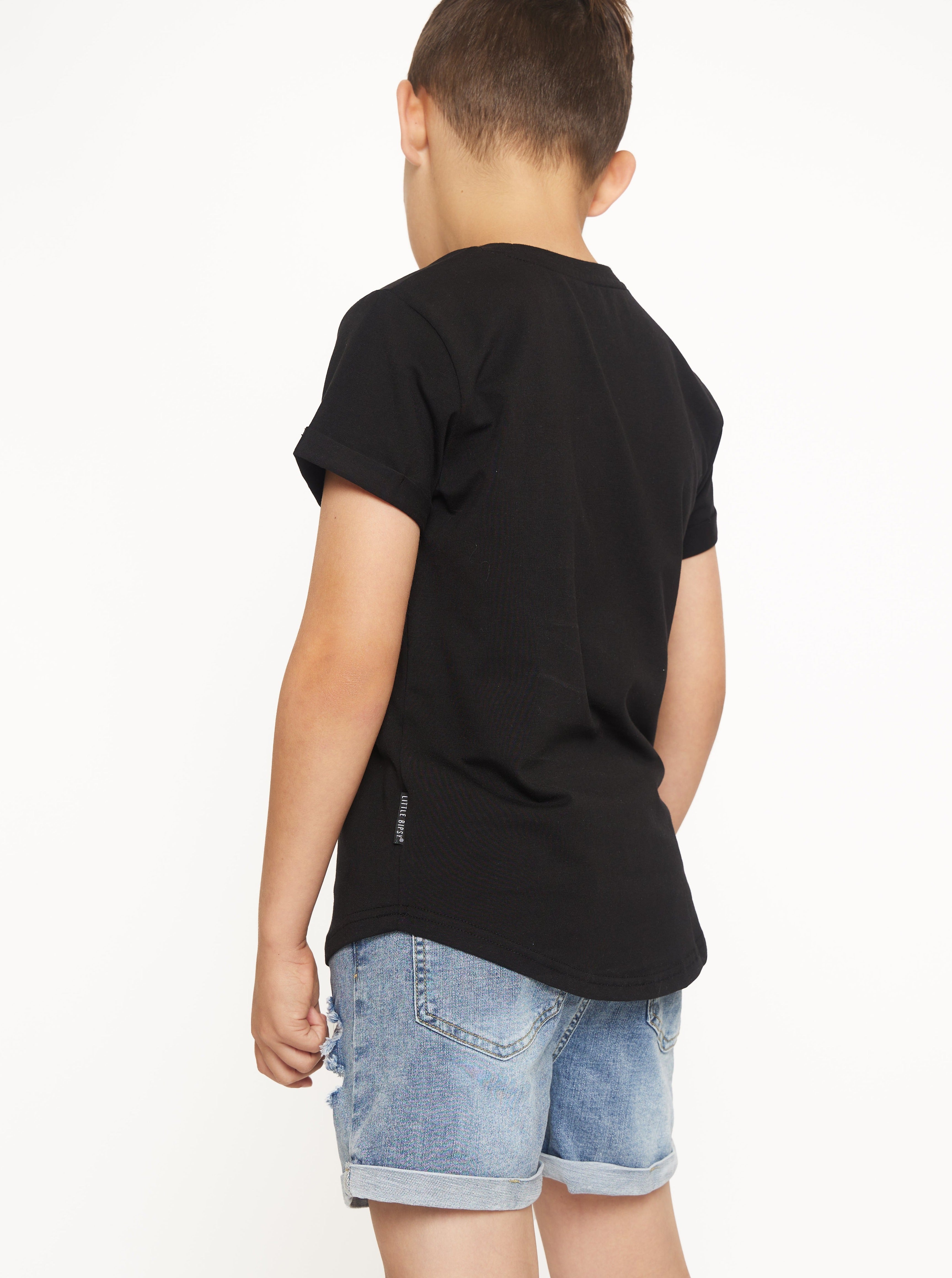 Boy in kids basic tee in black and kids denim shorts