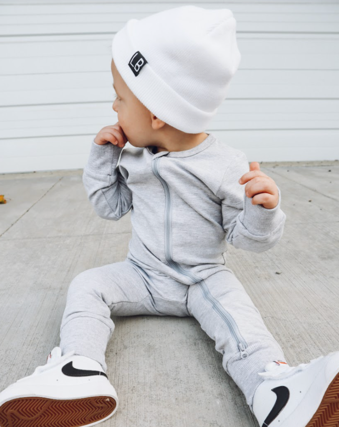 Baby boy in grey little bipsy onesie