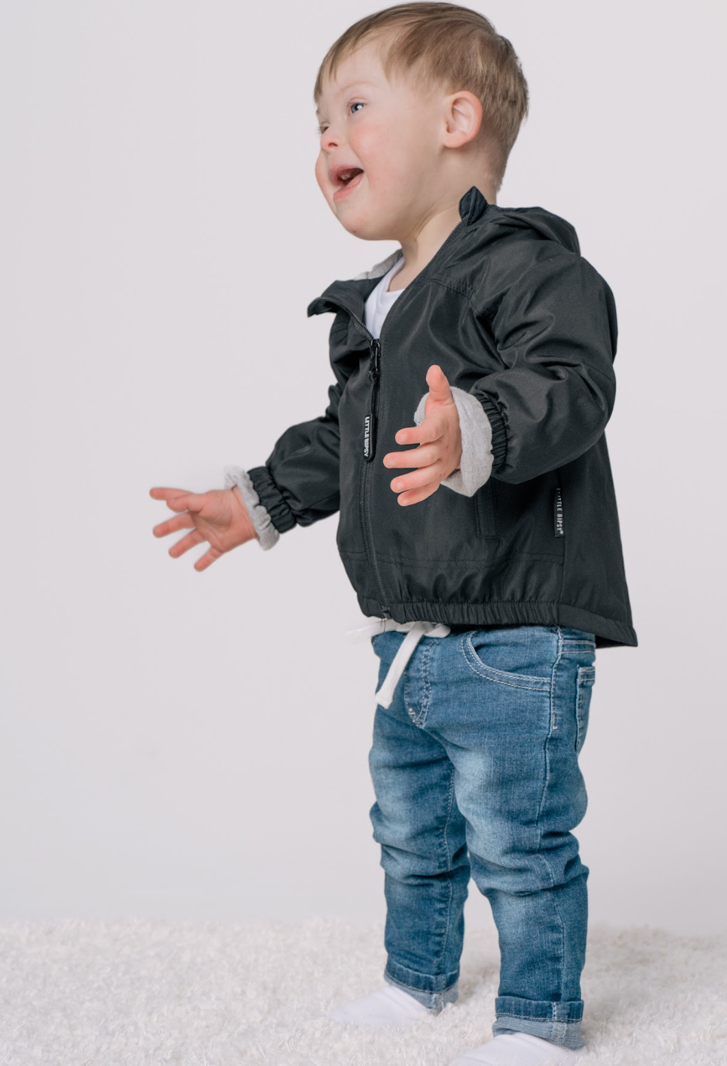 toddler in trendy kids outfit with baby denim